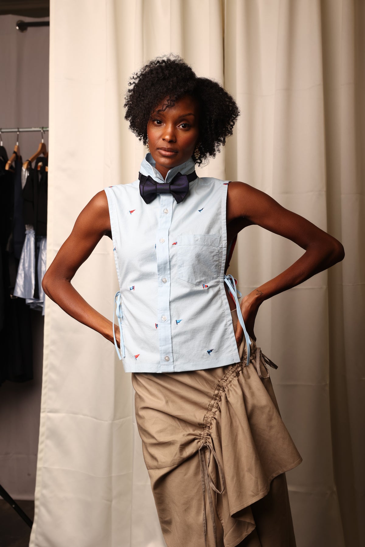 sleeveless button-front blouse